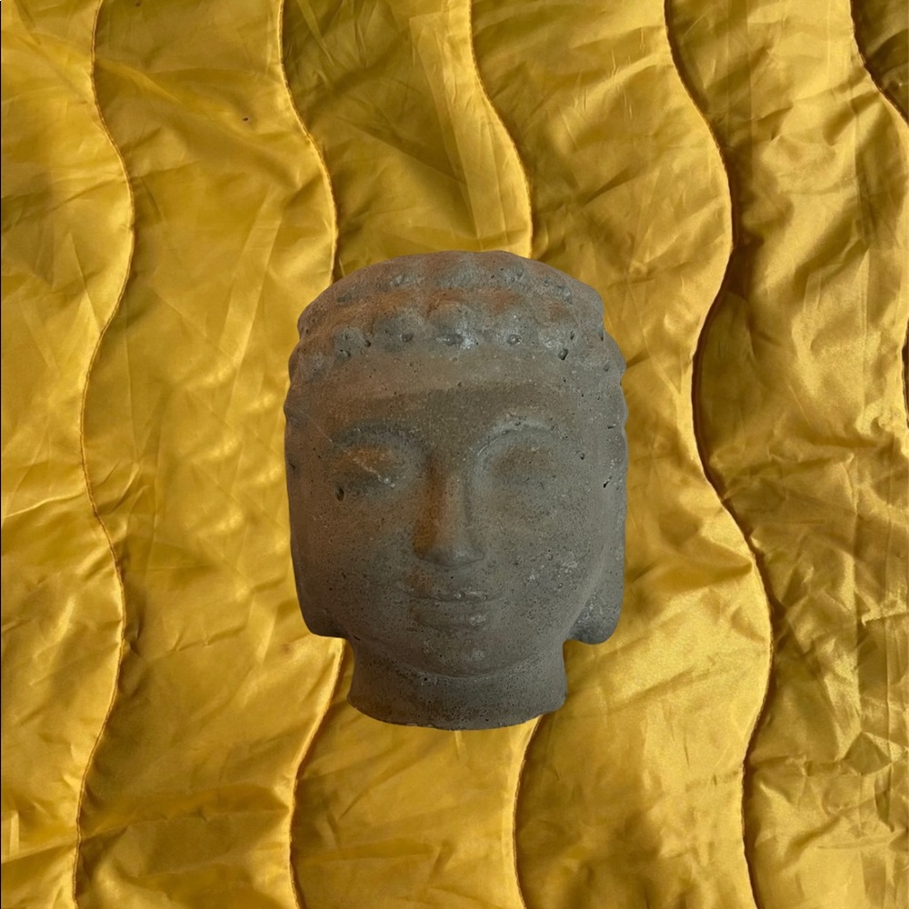 gray buddha head planter